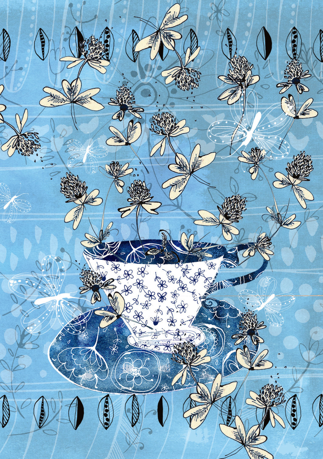 Blue teacup with floral design on a blue background