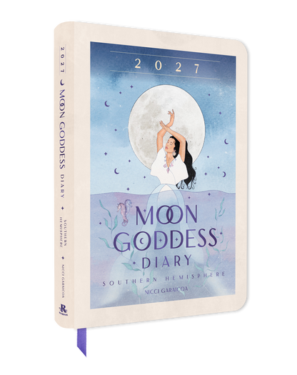 Moon Goddess Diary 2027 with a woman in a white dress and black hair holding a staff against a blue sky with moon and stars.