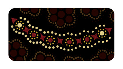Decorative pattern with red, gold, and white elements on a black background