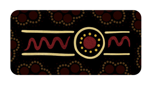 Decorative mat with tribal patterns on a black background