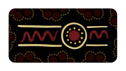 Decorative mat with tribal patterns on a black background