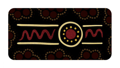 Decorative mat with tribal patterns on a black background