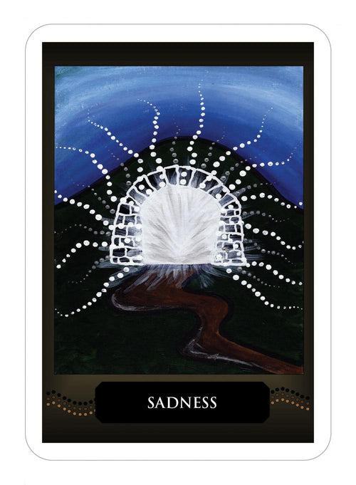Card with a central light symbol and 'Sadness' text against a dark background