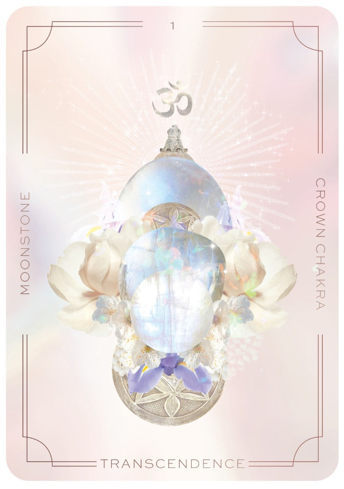 Crystal pendant with moonstone on a card featuring spiritual symbols and text.
