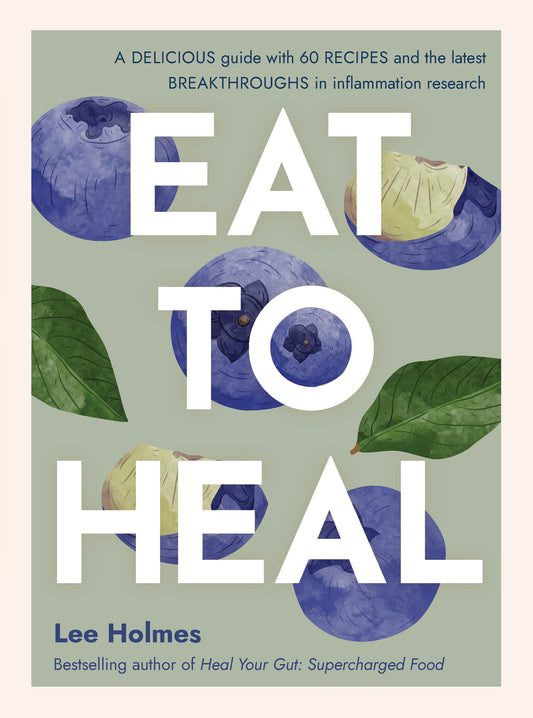 Book cover of 'Eat to Heal' with blueberries and vegetables on a light green background