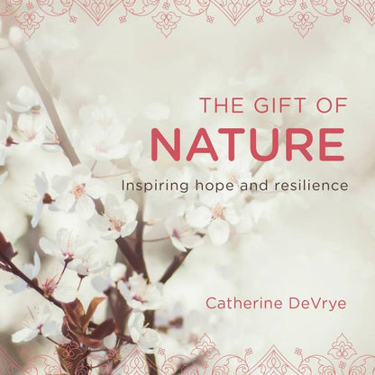 Book cover of 'The Gift of Nature' by Catherine DeVrye with cherry blossoms and decorative elements.