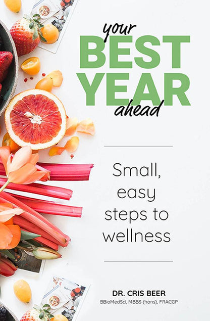 Book cover of 'Your Best Year Ahead' with fruits and flowers on a white background