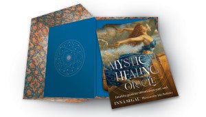 Book titled 'Mystic Healing Oracle' with a blue cover and artistic design on a white background
