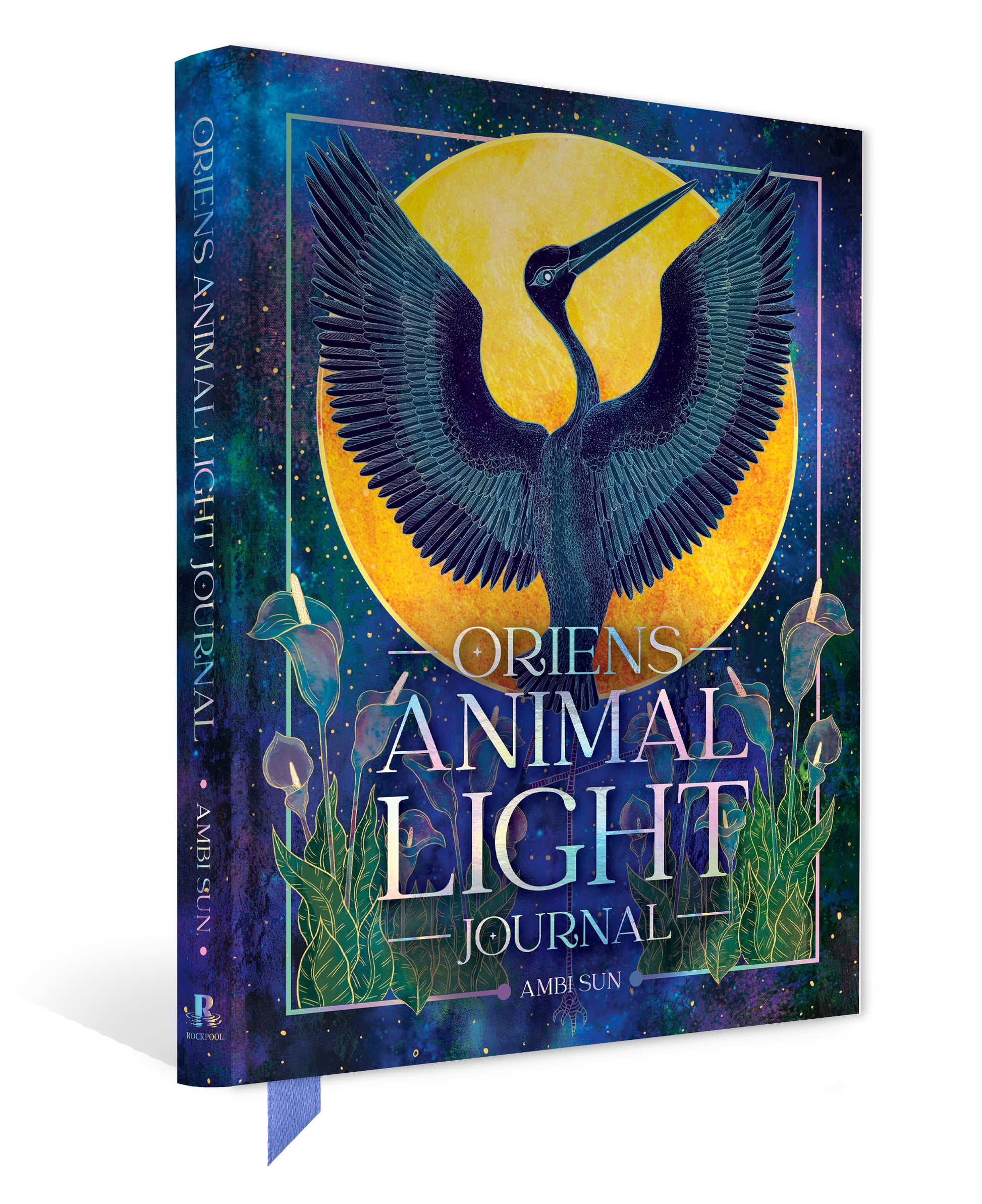 Book titled 'Oriens Animal Light Journal' with a bird design on the cover