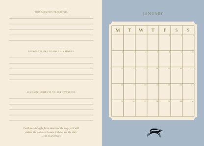 Calendar page for January with a blue background and beige text area.