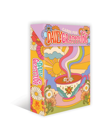 Colorful packaging for 'Daily Gratitude' cards with a coffee cup and floral design on a white background.