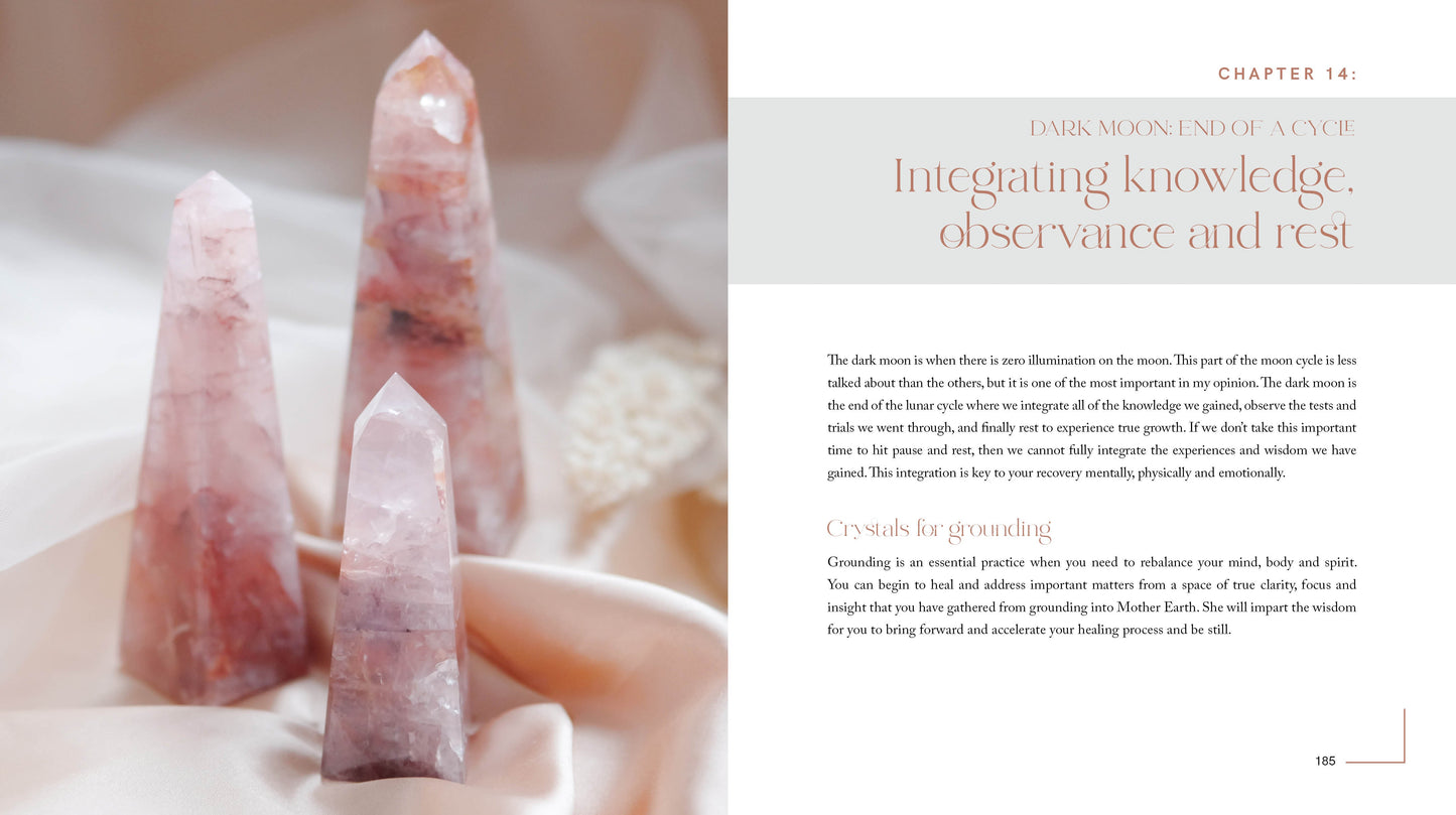 Close-up of pink crystal points held in hands with a text page on integrating knowledge, observance, and rest.