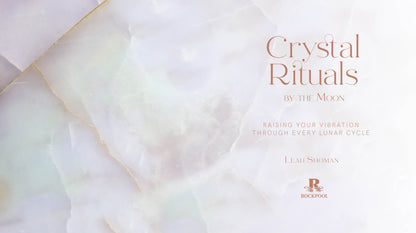 Book cover of 'Crystal Rituals by the Moon' with a soft, blurred background.