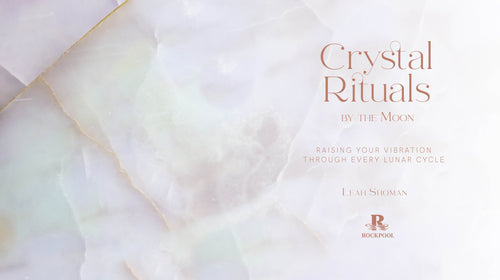 Book cover of 'Crystal Rituals by the Moon' with a soft, blurred background.