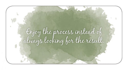 Motivational quote on a watercolor background with a green splash.
