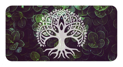 White tree of life design on a dark background with green circular patterns