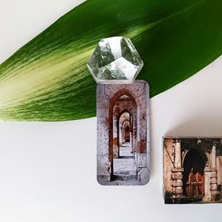 Decorative items with archway designs on a white background