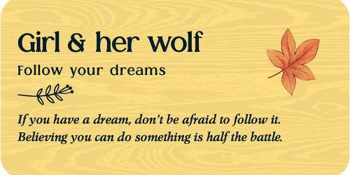 Wooden plaque with text 'Girl & her wolf Follow your dreams' and a leaf design on a wooden background.
