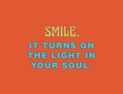 Motivational quote 'SMILE. IT TURNS ON THE LIGHT IN YOUR SOUL.' on an orange background