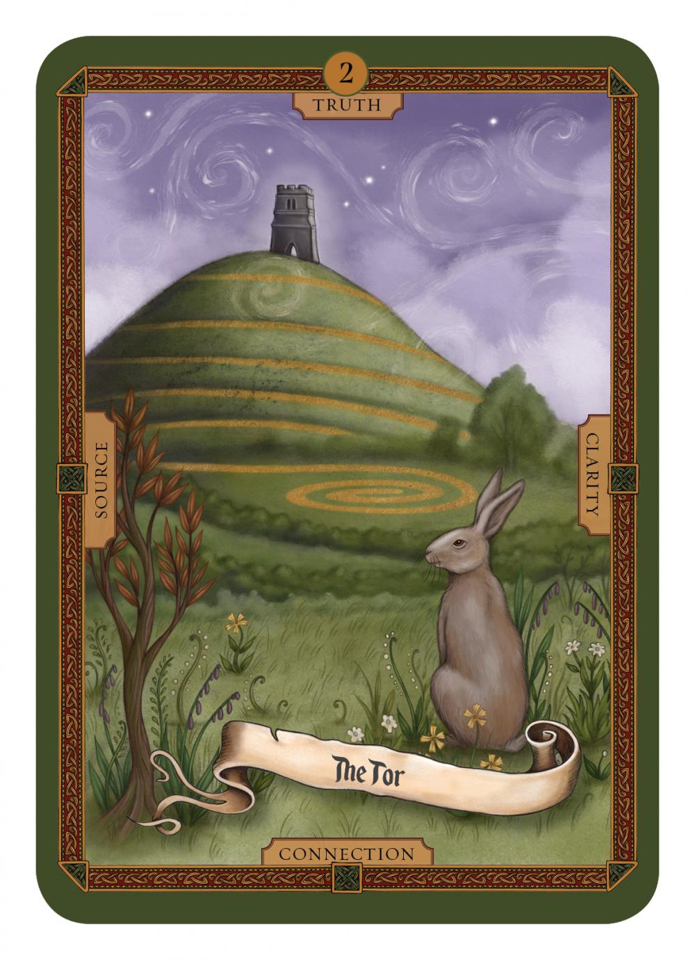 Tarot card with a rabbit, hill, and tower on a purple background