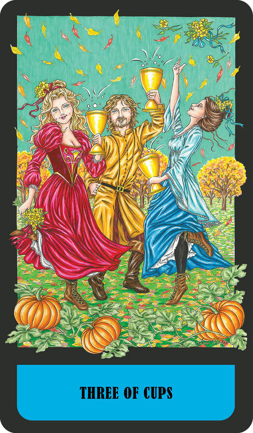Three people holding cups in a celebratory scene with pumpkins and autumn leaves, labeled 'Three of Cups'.