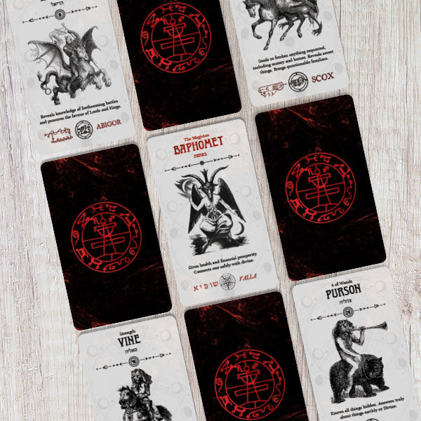 Collection of tarot cards with various designs and symbols on a wooden surface