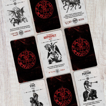 Collection of tarot cards with various designs and symbols on a wooden surface