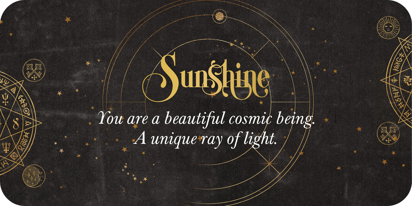 Motivational card with 'Sunshine' text and celestial design on a dark background