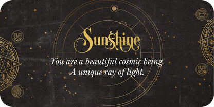 Motivational card with 'Sunshine' text and celestial design on a dark background