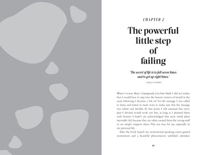 Book page with text and abstract shapes on a gray background