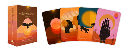 Set of tarot cards with colorful designs and a box labeled 'wild whispers oracle'.
