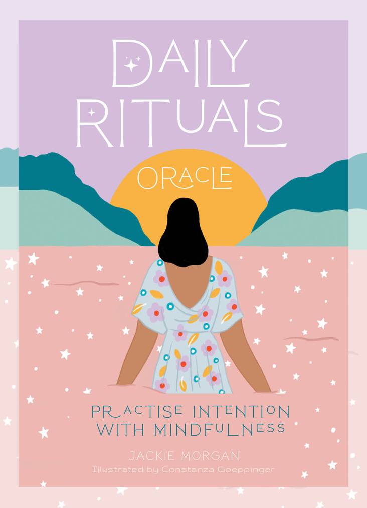 cover of 'Daily Rituals Oracle' by Jackie Morgan with a person sitting under a sun and mountains.